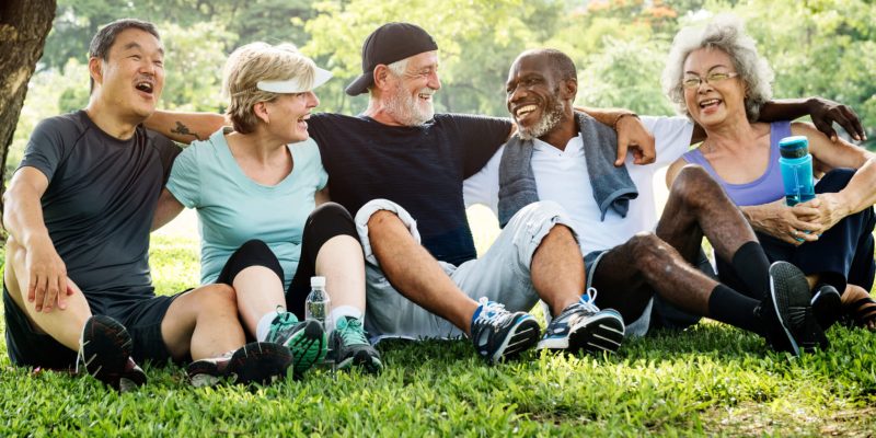 Older-adult-friends-relaxing-after-exercising-scaled.jpeg